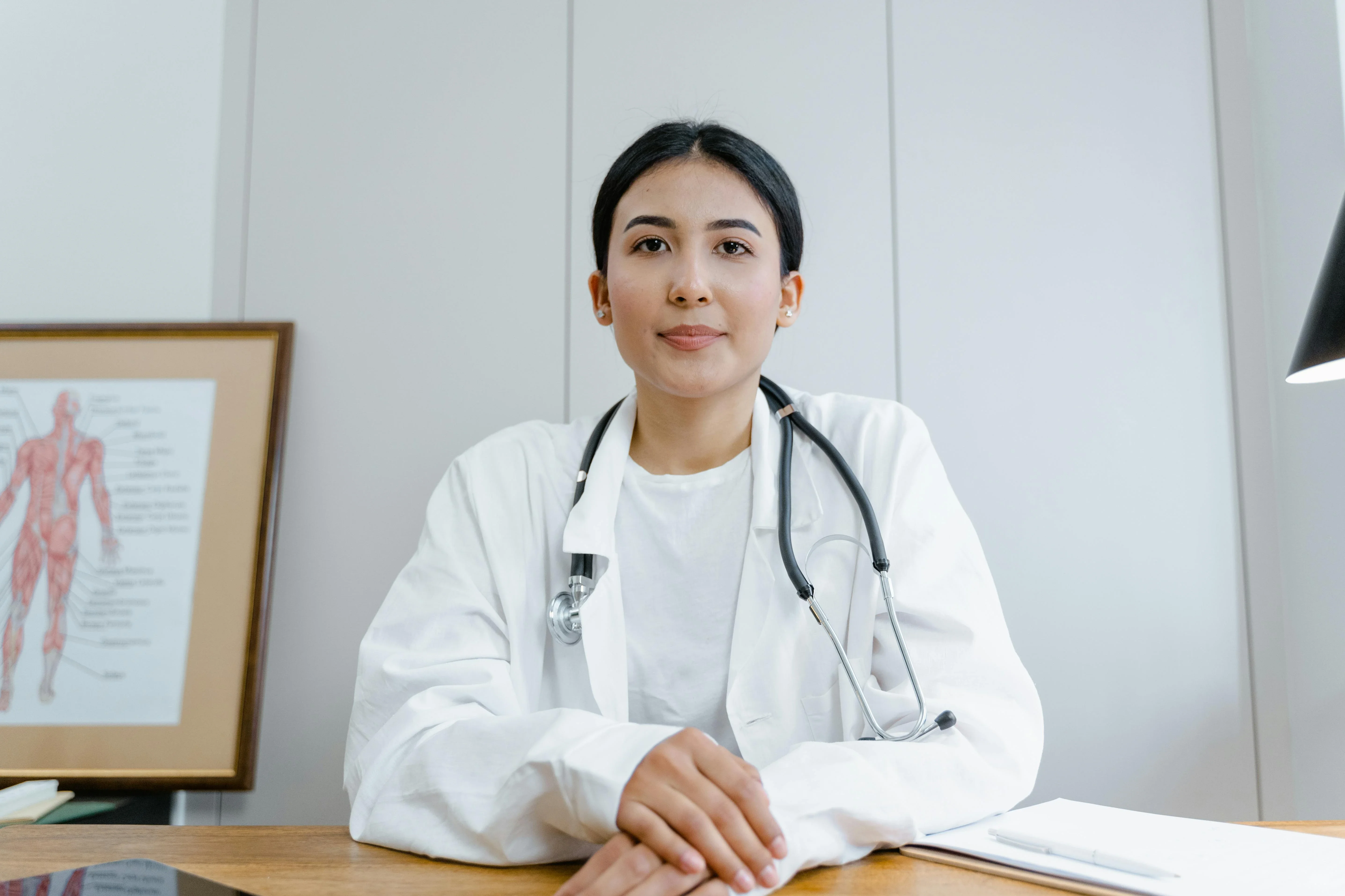 Happy doctor with satisfied patient
